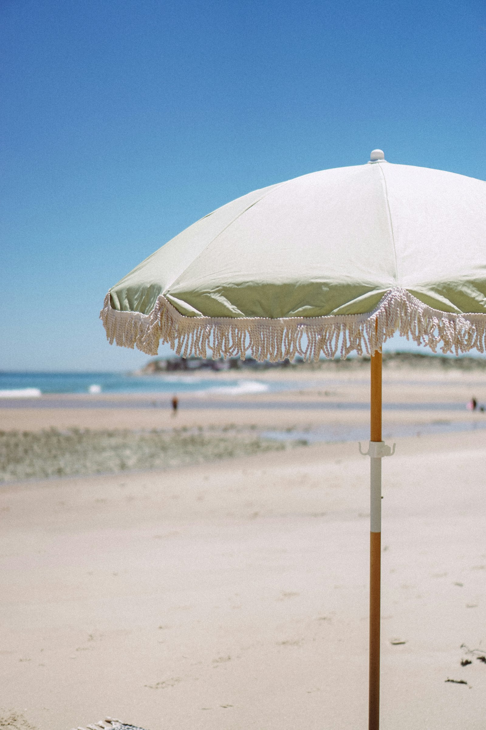 Sage umbrella on the beach